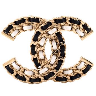 chanel metal and lambskin brooch